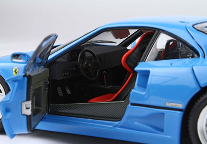 Blue Ferrari model car with open door showing detailed black and red interior, available on Vroomi