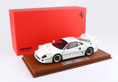 White Ferrari F40 model car on brown display base with red Kyosho box, available on Vroomi