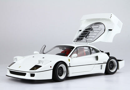 White Ferrari F40 sports car model with open rear engine cover and driver's door, showcasing red seats, available via Vroomi