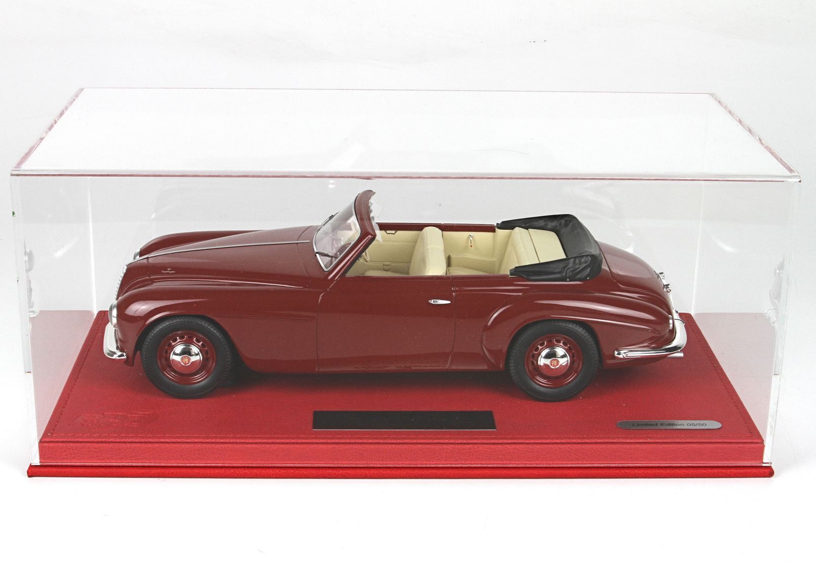 Limited edition maroon classic convertible model car in clear display case on red base, offered on Vroomi