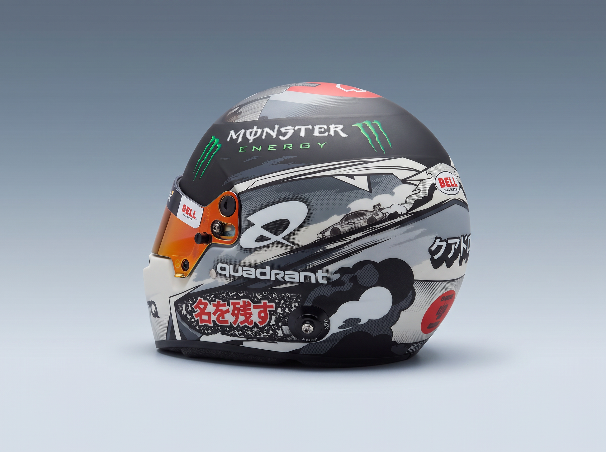 Monster Energy racing helmet with Bell branding, graphic art, and Japanese text — scale model car accessory at Vroomi