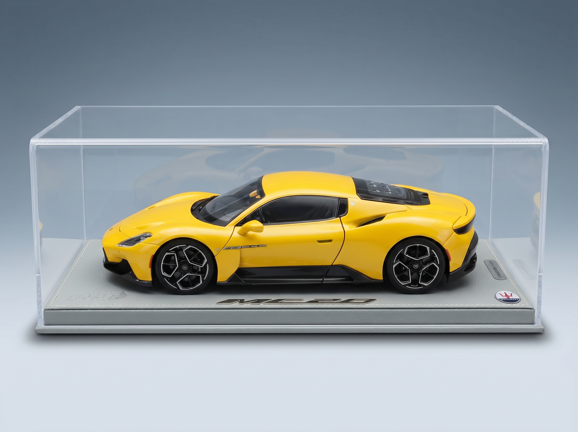 Nano_Banana_Pro_-_High-end_studio_photograph_of_a_118_scale_model_car__inside_its_complete_original - Vroomi