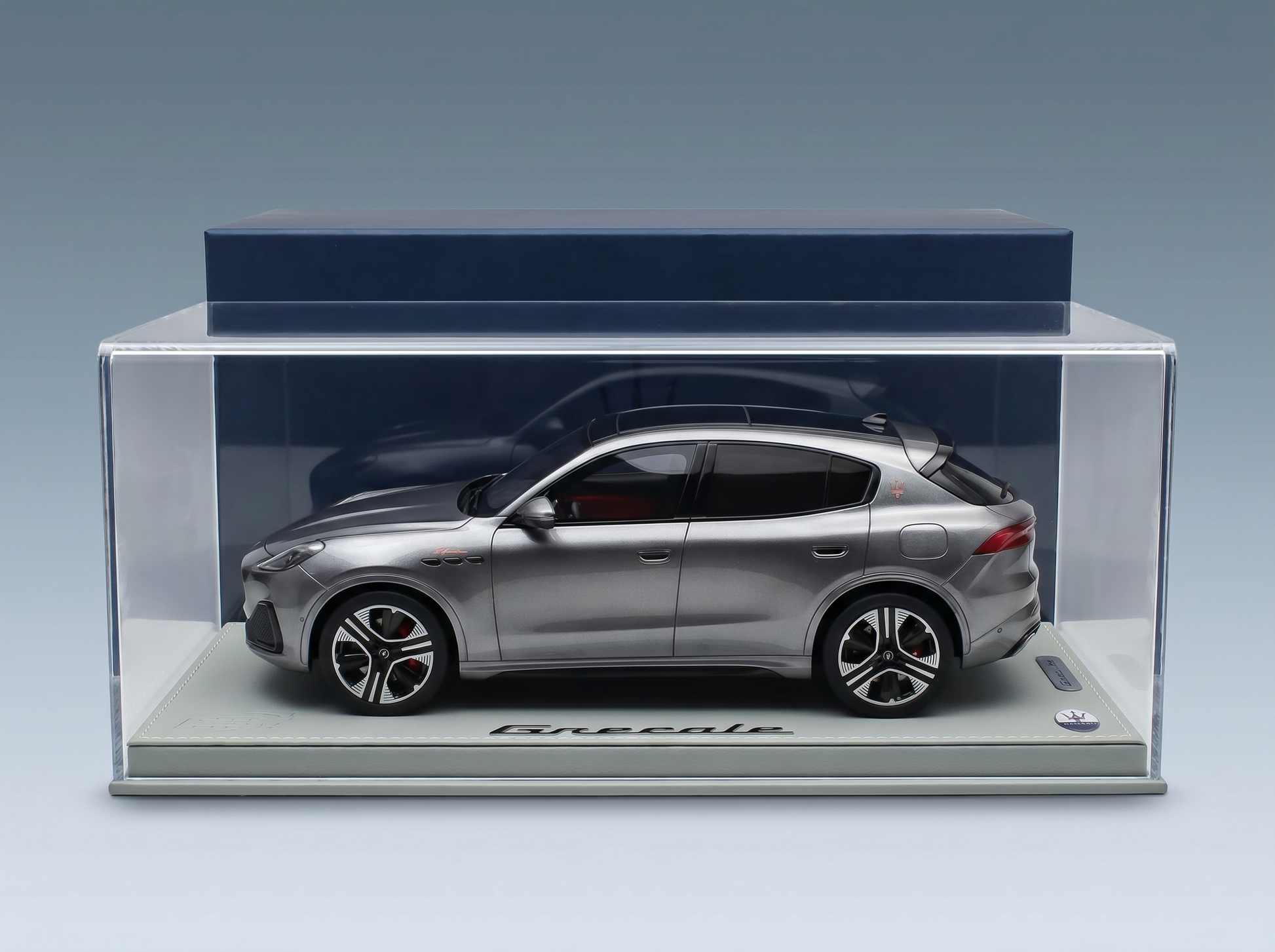 Nano_Banana_Pro_-_High-end_studio_photograph_of_a_118_scale_model_car__inside_its_complete_original_3 - Vroomi