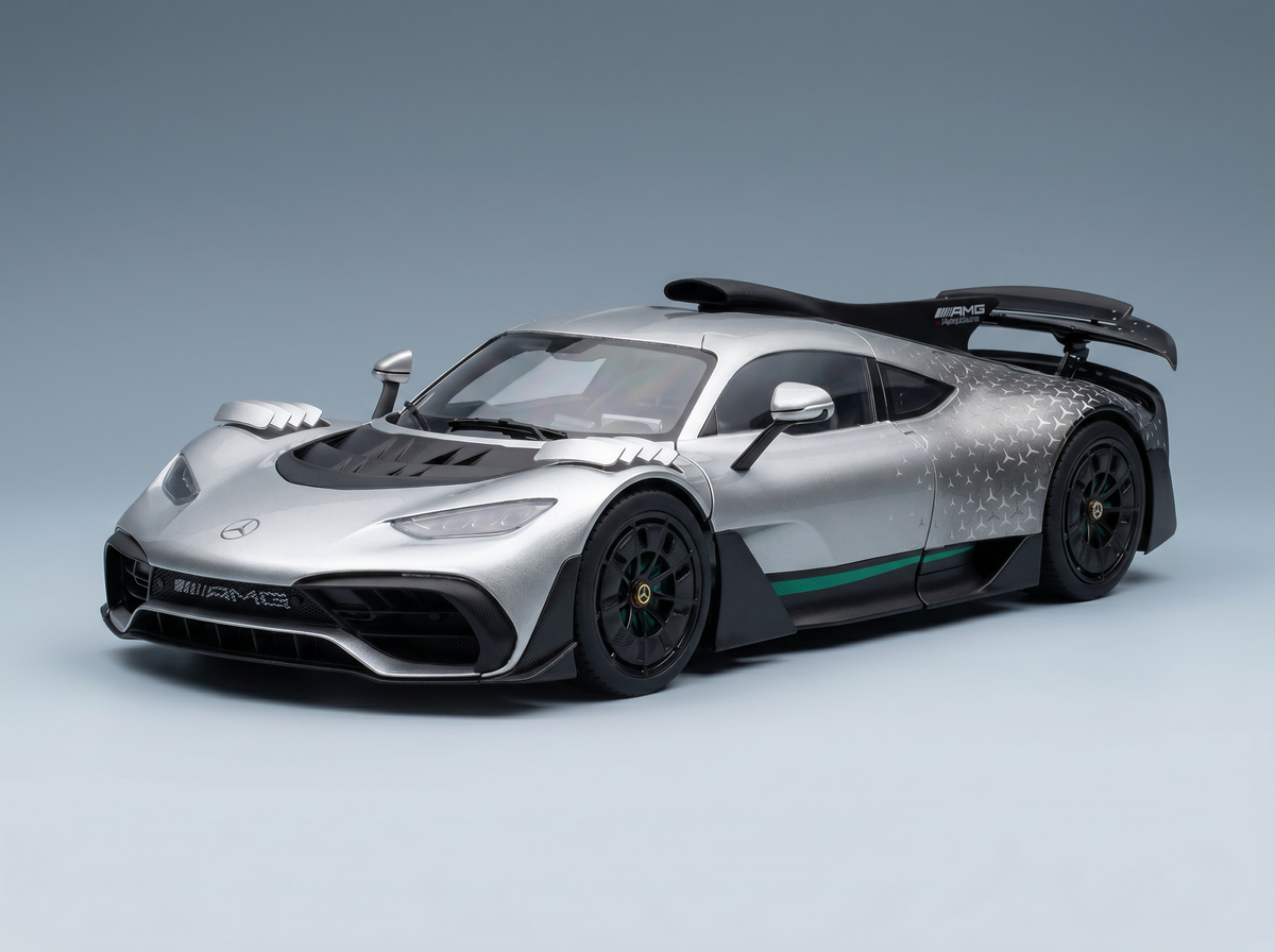 Silver Mercedes-AMG ONE scale model car with green accents, showcased by Vroomi for collectors.