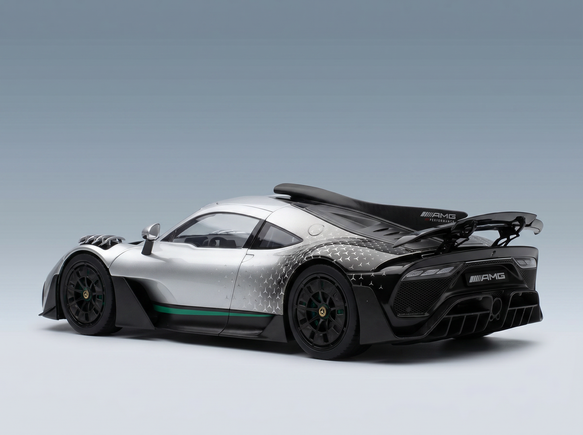 Silver AMG scale model car with black accents, showcased at Vroomi for collectors.