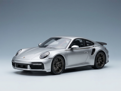 Silver Porsche 911 Turbo S scale model car from Vroomi, featuring detailed design and black wheels