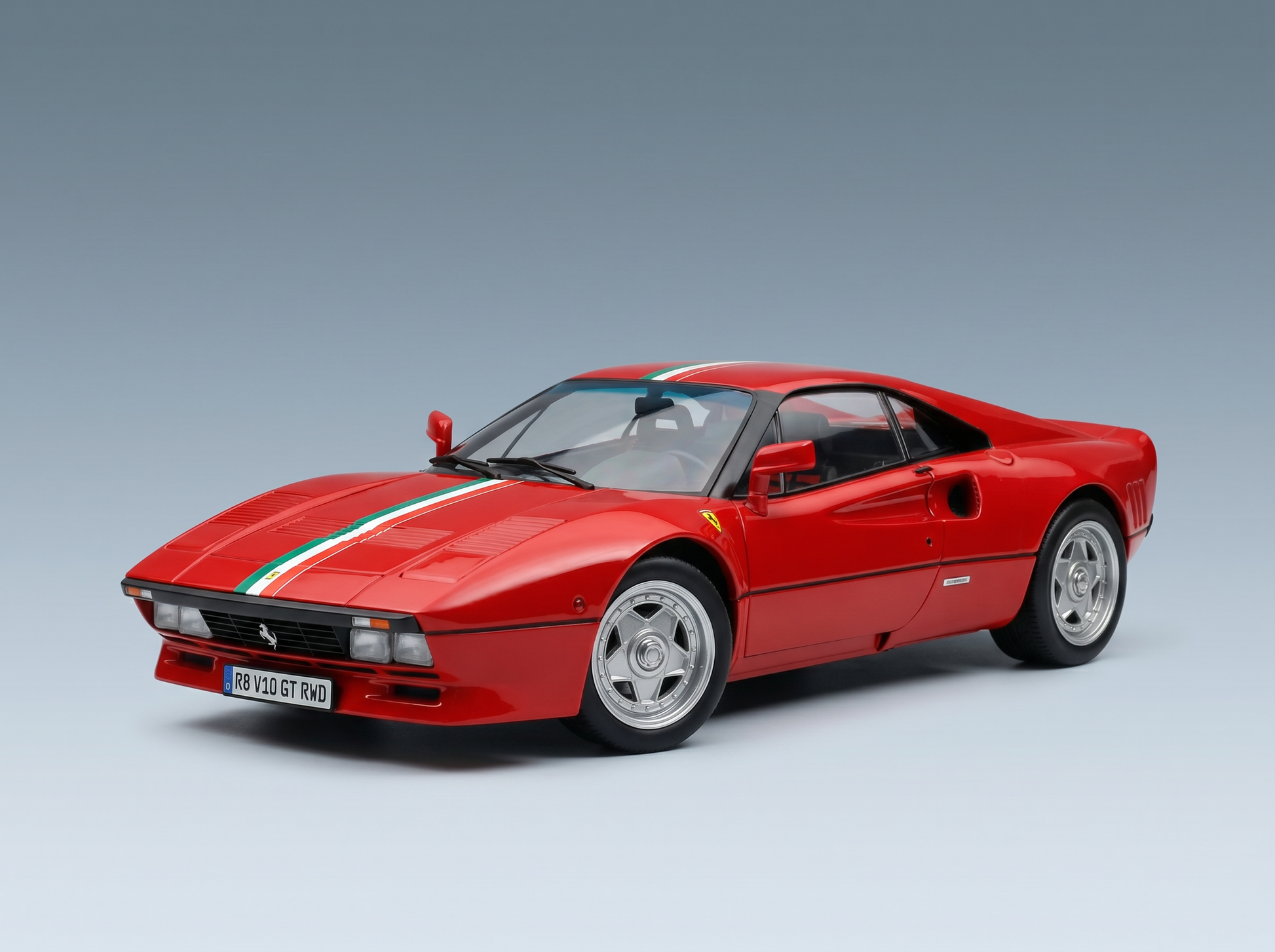 Red Ferrari scale model car with Italian tricolor stripe, showcased by Vroomi for collectors