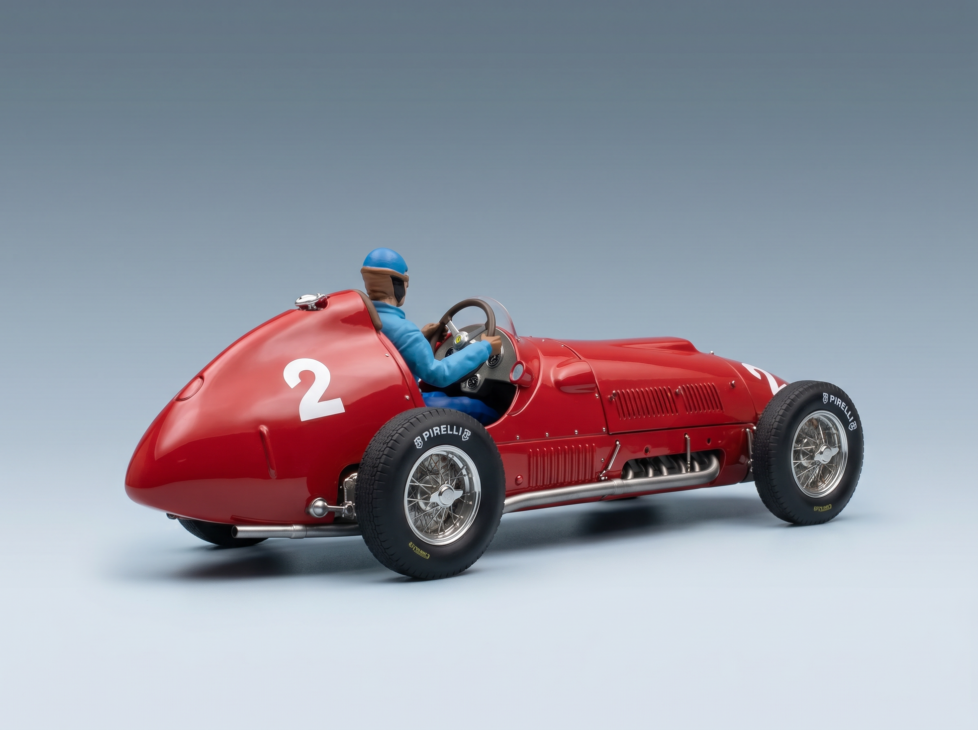Red vintage race car scale model with driver, Pirelli tires — Vroomi collector's replica