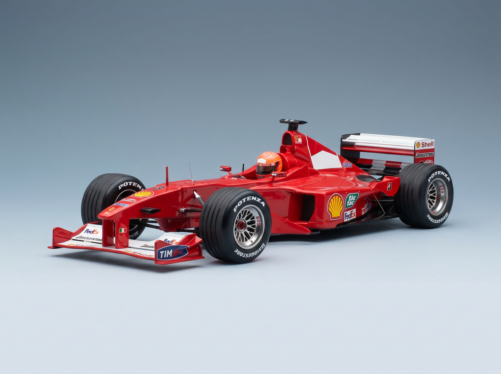 Maquette de voiture de F1 Ferrari rouge avec les logos Shell, FedEx et Bridgestone — Vroomi