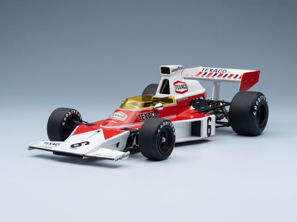 Modèle réduit rouge et blanc d'une voiture de Formule 1 Texaco, équipé de pneus Goodyear, numéro 6, de la marque Vroomi