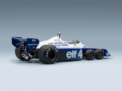 Blau-weißes Elf-Modellauto im Maßstab 1:4 mit Goodyear-Reifen, präsentiert von Vroomi für Sammler.