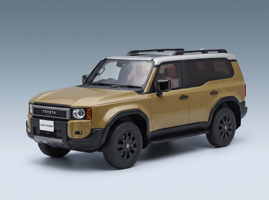 Toyota Land Cruiser scale model car in gold and white, featuring black wheels and roof rails, from Vroomi