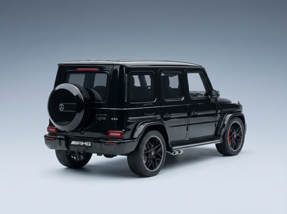 Schwarzes Mercedes-AMG G63-Modellauto von Vroomi mit detailgetreuem Design und eleganter Oberfläche.