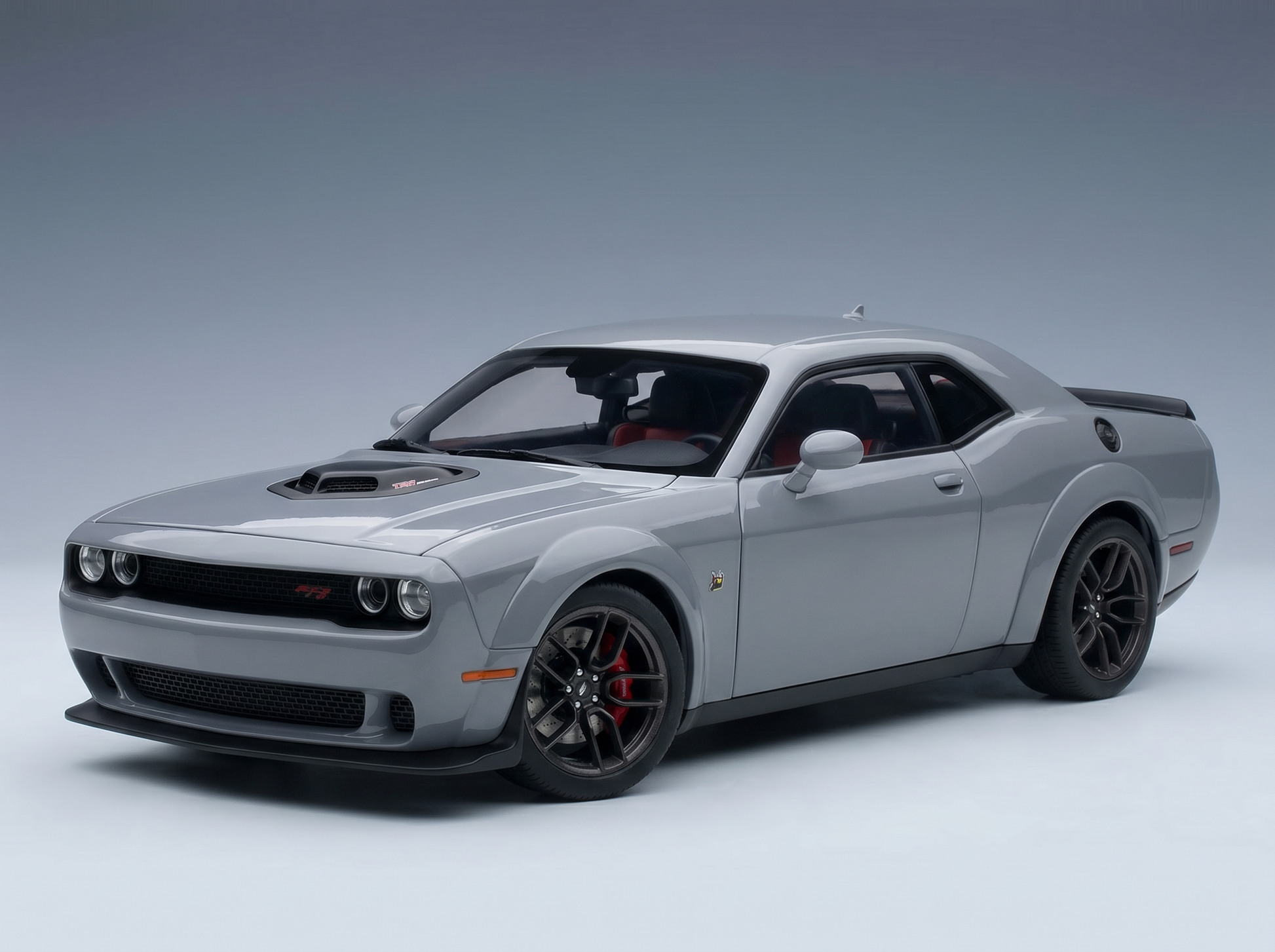 Gray Dodge Challenger SRT Hellcat scale model car with black rims, showcased by Vroomi for collectors.