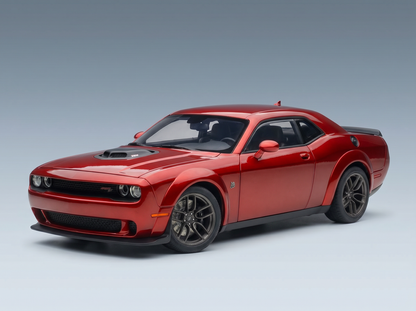 Red scale model car from Vroomi, showcasing detailed design and sleek finish