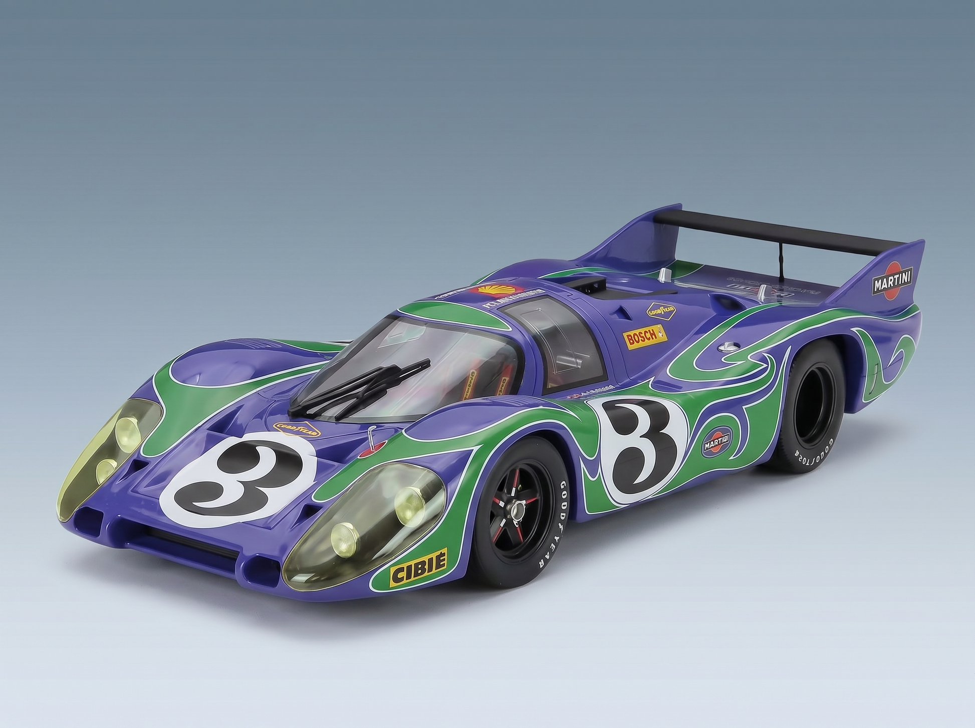 Purple and green Martini-liveried scale model car with number 3, featured at Vroomi