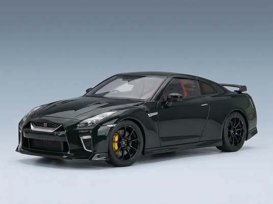 Green Nissan GT-R scale model car with yellow brake calipers, showcased by Vroomi