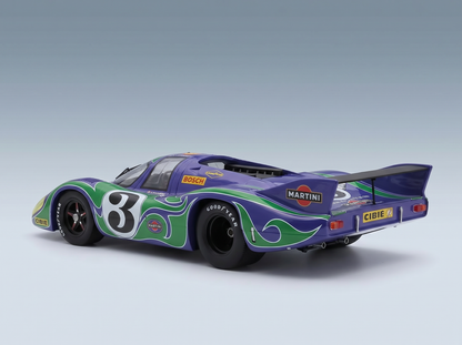 Purple and green Martini-liveried scale model car with number 3, featuring Bosch and Goodyear logos, from Vroomi.