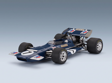 Blue 1970s Formula 1 scale model car with Elf & Dunlop livery, displayed by Vroomi