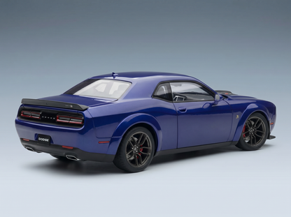 Blue Dodge Challenger scale model car from Vroomi, featuring black rims and rear spoiler on gradient background