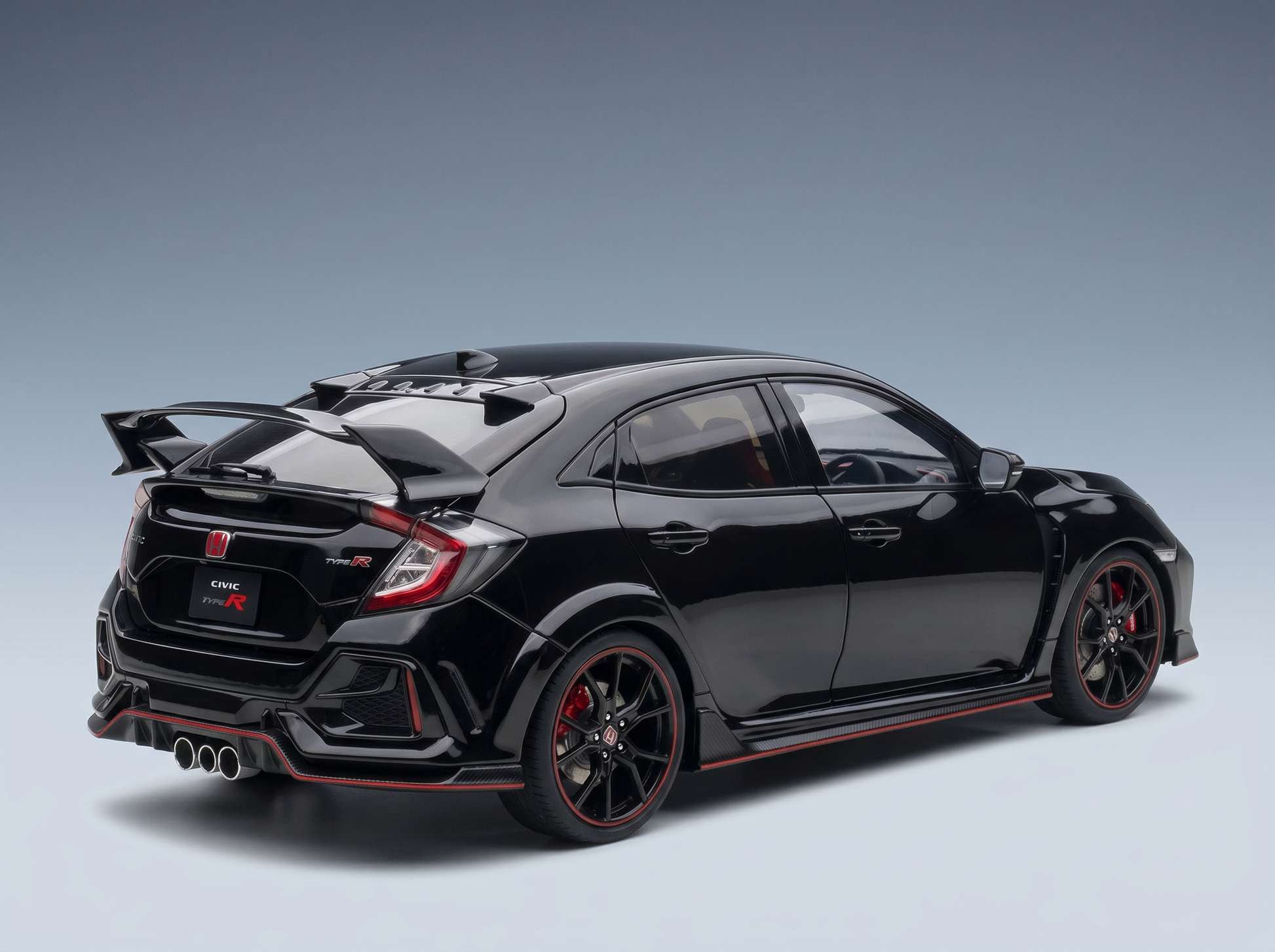 Black Honda Civic Type R scale model car with red accents, showcased by Vroomi for collectors