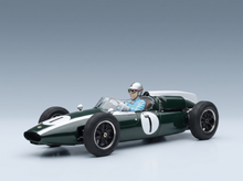 Green and white scale model car with driver, Vroomi collection