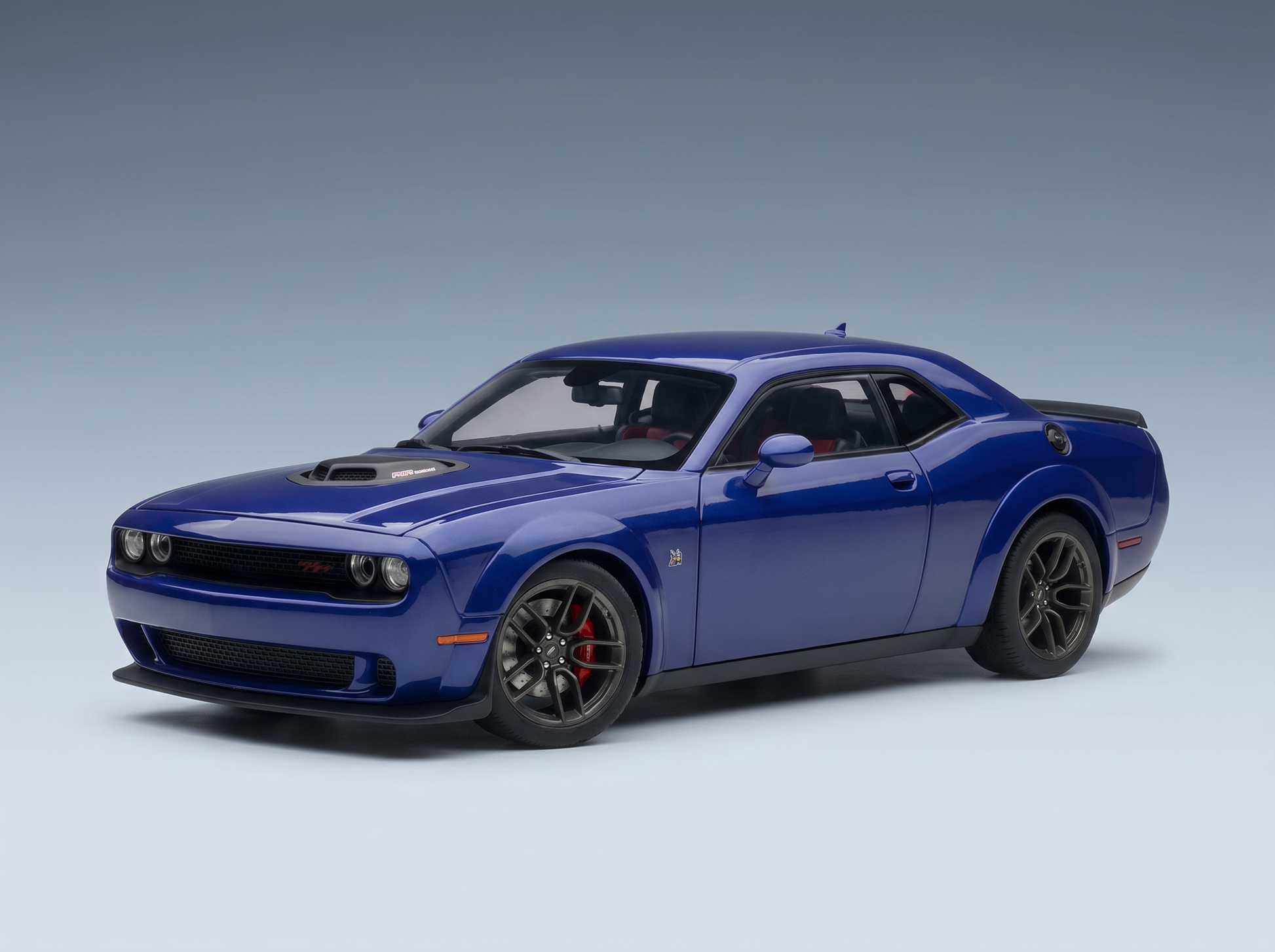 Blue Dodge Challenger SRT Hellcat scale model car from Vroomi, featuring black rims and detailed exterior.