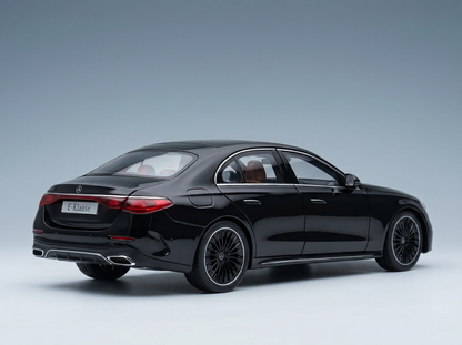 Black Mercedes-Benz E-Klasse scale model car from Vroomi, showcasing sleek design and detailed alloy wheels.
