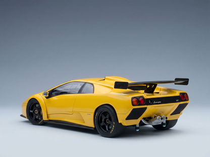 Yellow Lamborghini scale model car with rear spoiler, showcased by Vroomi for collectors.