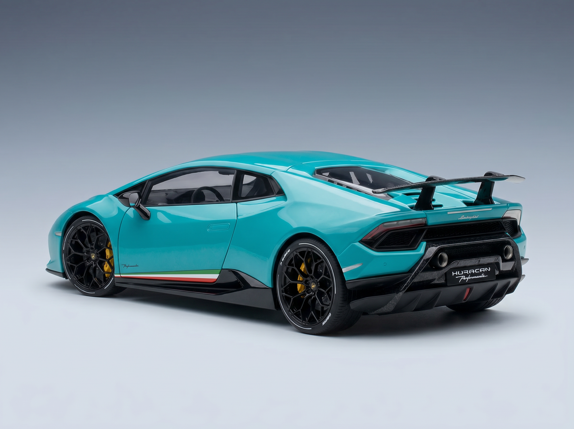Teal Lamborghini Huracan Performante scale model car with black rims and rear wing, Vroomi