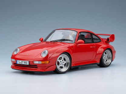Red Porsche 911 GT2 scale model car with wide body and rear wing, showcased by Vroomi for collectors.