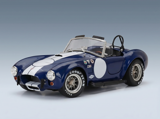 Blau-weißes Shelby Cobra 427-Modellauto mit Goodyear-Reifen, präsentiert von Vroomi für Sammler.