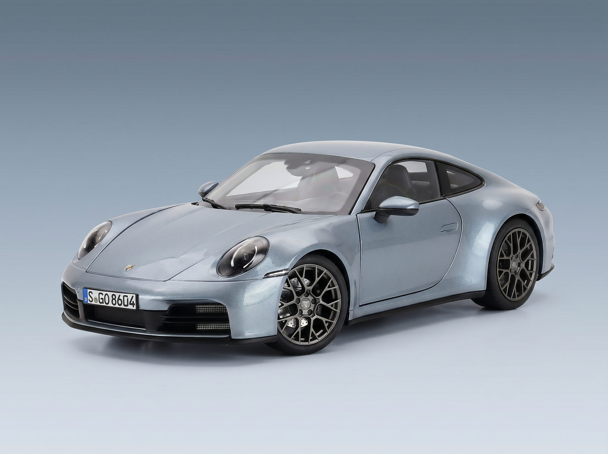 PORSCHE - 911 992-2 CARRERA COUPE 2025 - SILVER Scale model car on Vroomi