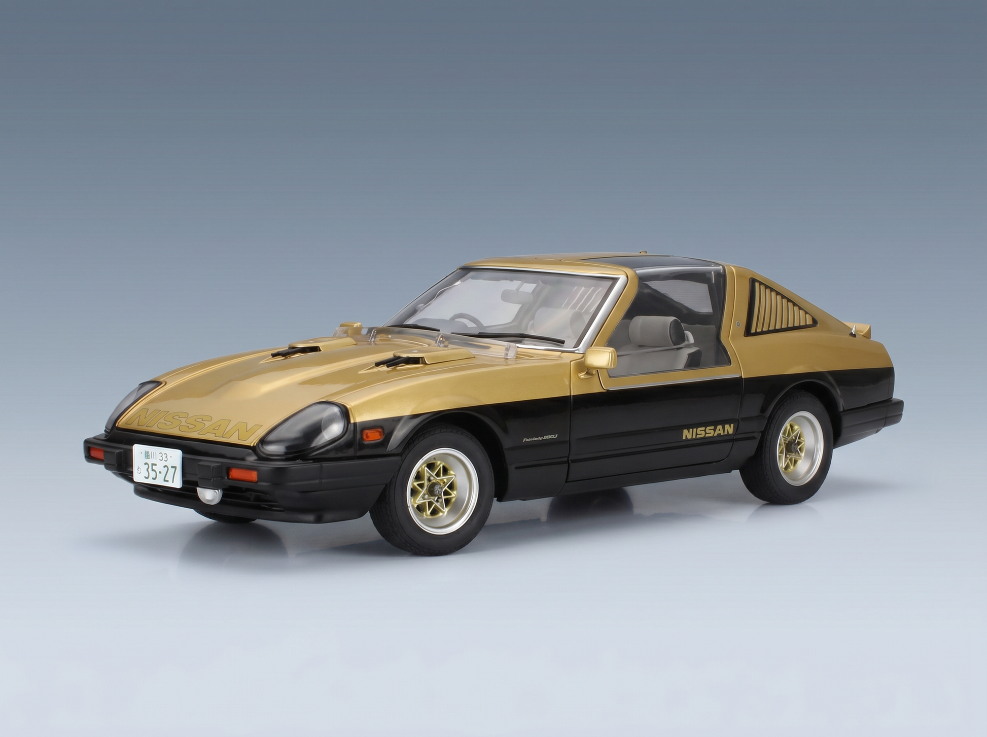 Gold-schwarzes Nissan 280ZX-Modellauto von Vroomi, detailgetreue Druckguss-Nachbildung für Sammler