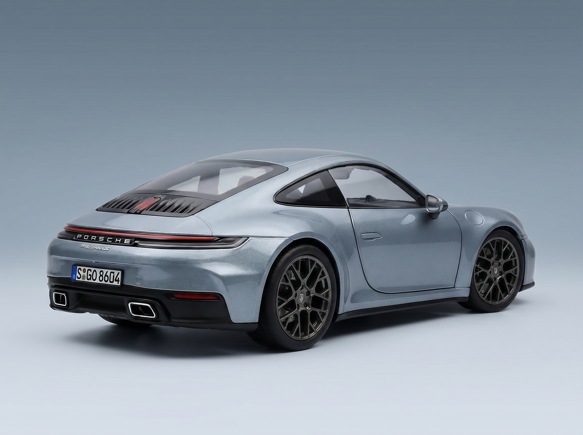 PORSCHE - 911 992-2 CARRERA COUPE 2025 - SILVER Scale model car on Vroomi