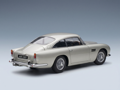 Silver Aston Martin DB5 scale model car from Vroomi, showcasing classic design and wire wheels.