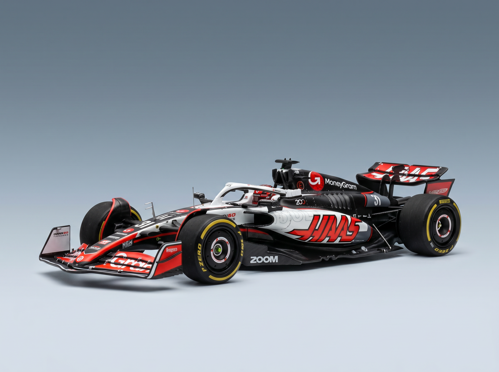 HAAS - F1 VF-25 TEAM MONEYGRAM HAAS N 31 CANADA GP 2025 ESTEBAN OCON - WHITE BLACK RED Scale model car on Vroomi