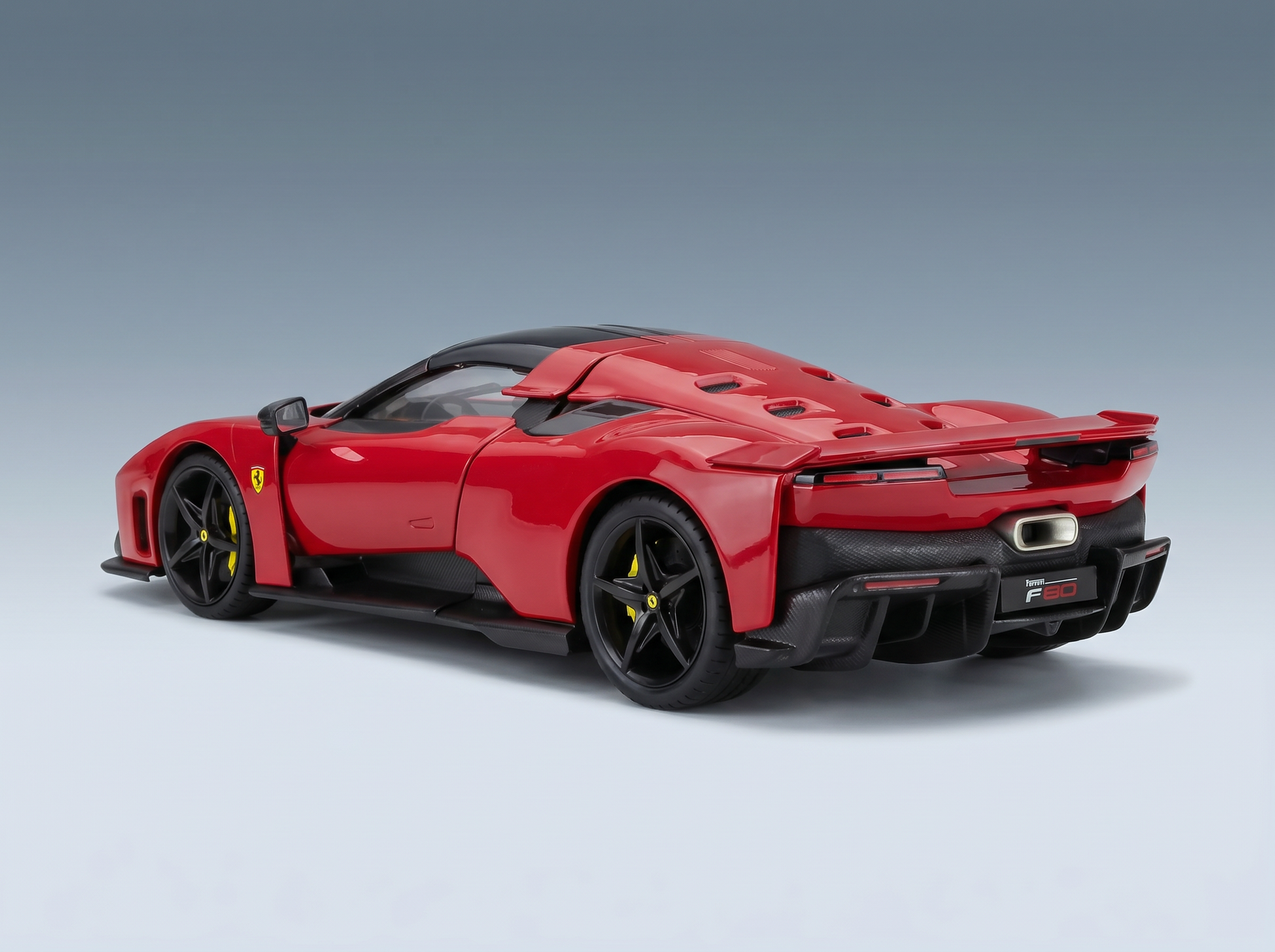 Red Ferrari F80 scale model car from Vroomi, showcasing sleek design and black accents