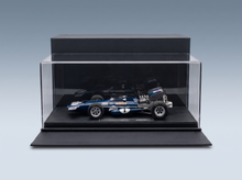 Blue Ford Formula 1 scale model car in display case, Vroomi collector's edition