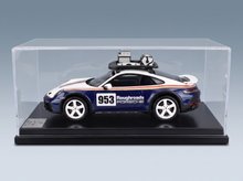 Porsche 953 Roughroads scale model car in display case, Vroomi collection
