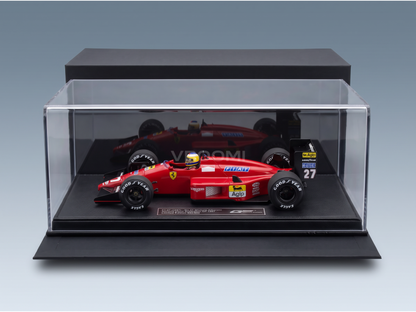 Red Ferrari F1-87 scale model car, No.27 Michele Alboreto, displayed in clear case. Vroomi collector's edition.