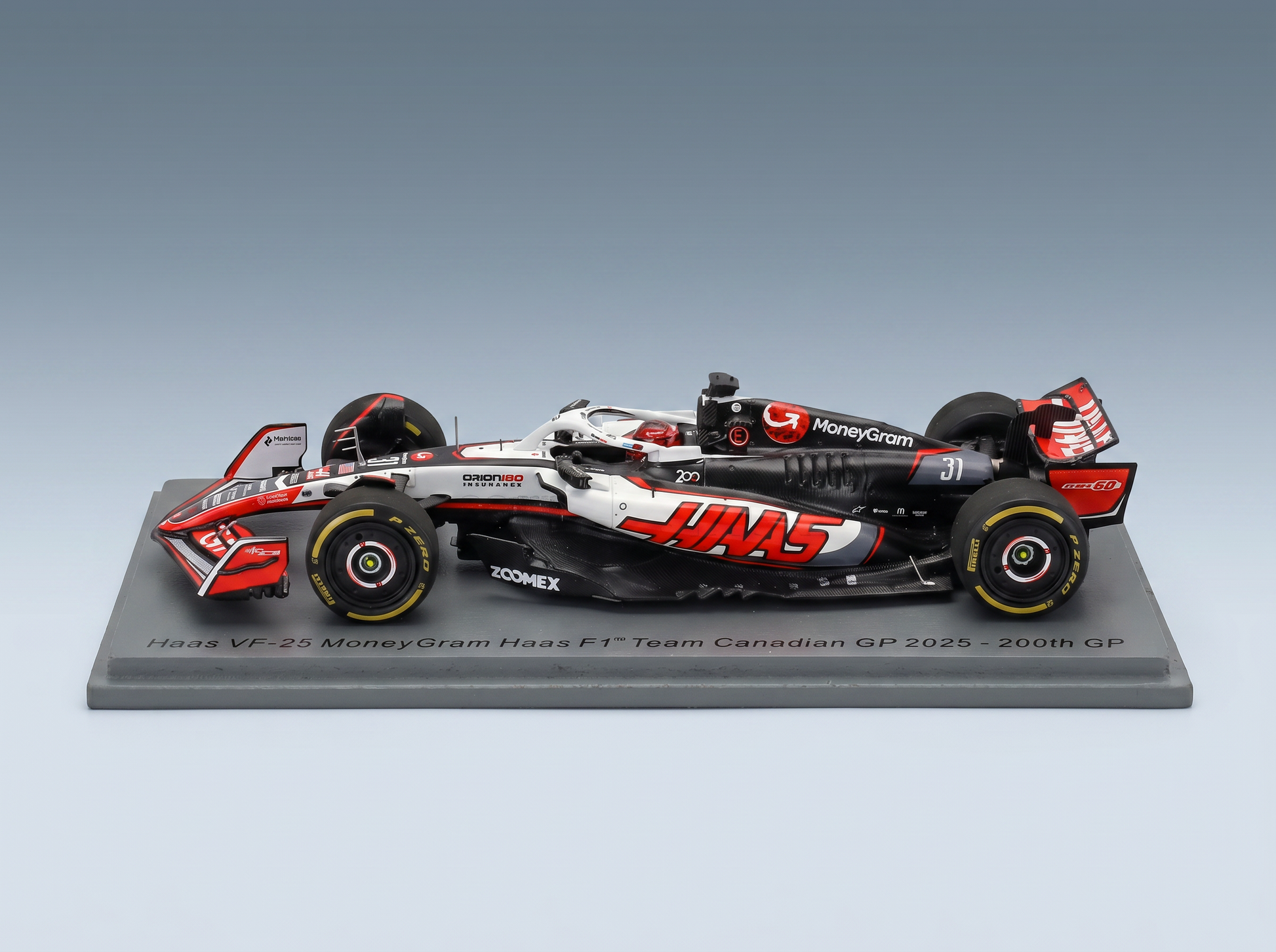 HAAS - F1 VF-25 TEAM MONEYGRAM HAAS N 31 CANADA GP 2025 ESTEBAN OCON - WHITE BLACK RED Scale model car on Vroomi