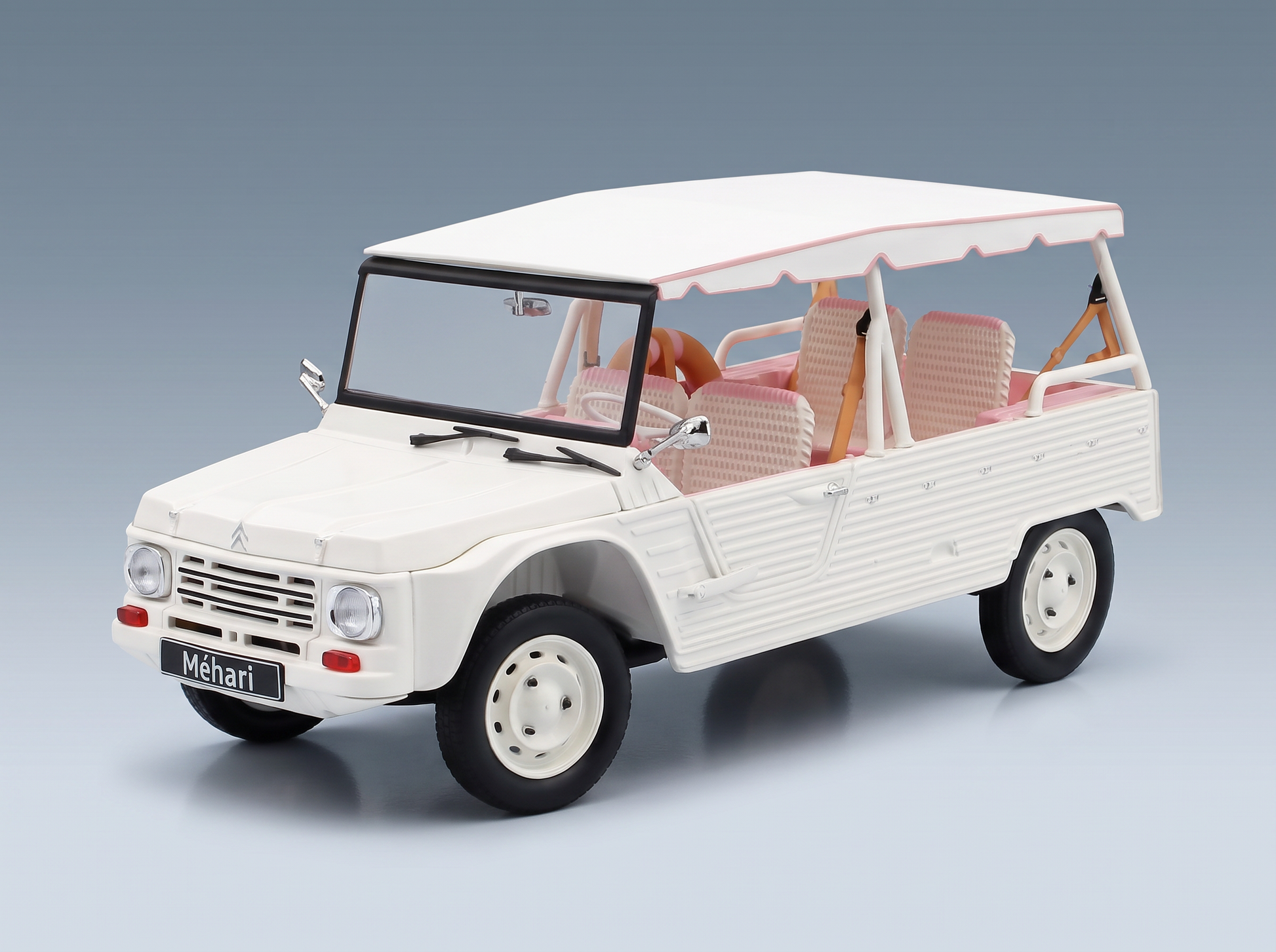 Maqueta de coche Citroën Méhari en color blanco con interior rosa, presentada por Vroomi para coleccionistas.