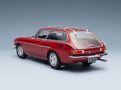 Maqueta de coche Volvo 1800 ES rojo con portaequipajes en el techo, vista trasera detallada — Vroomi