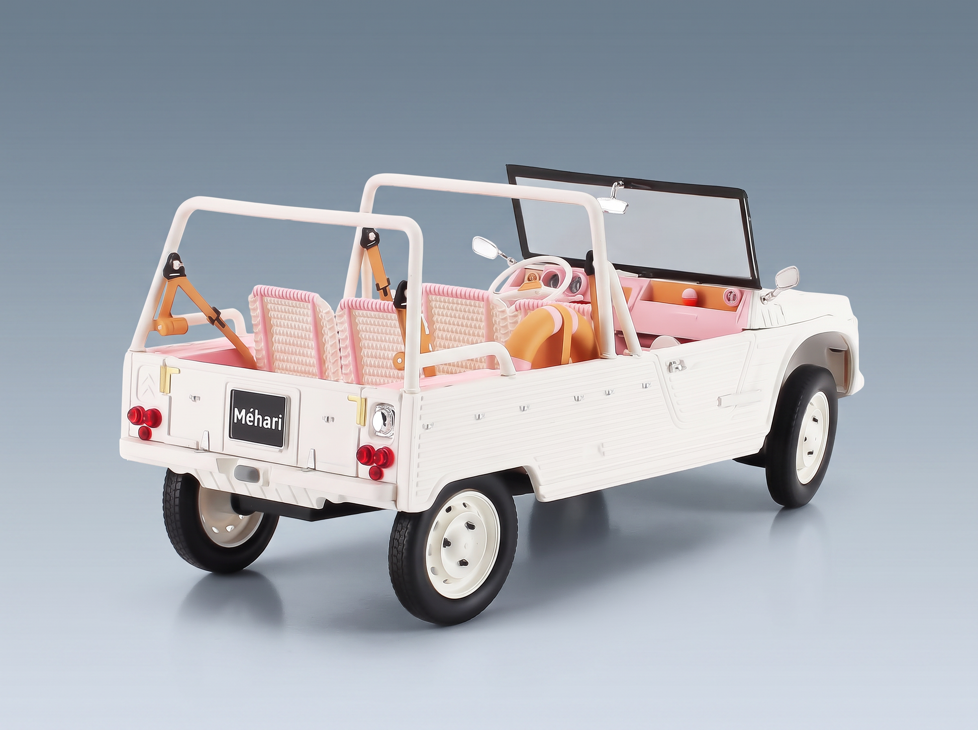 Maqueta de coche Citroën Méhari en color blanco con interior rosa, presentada por Vroomi para coleccionistas.