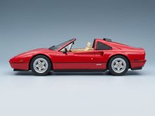 Rotes Ferrari-Modellauto mit hellbrauner Innenausstattung, präsentiert von Vroomi für Sammler und Motorsportfans.