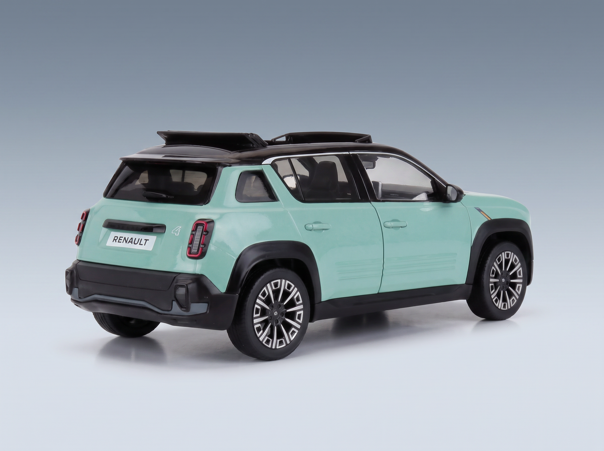 Mintgrünes Renault-4-Modellauto mit schwarzem Dach, präsentiert von Vroomi für Sammler.