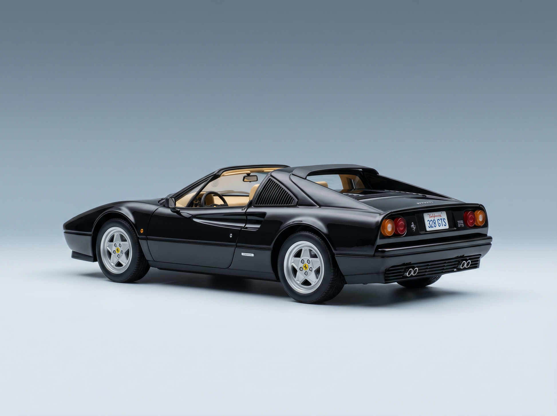 Black Ferrari 328 GTS scale model car from Vroomi, showcasing sleek design and detailed interior.