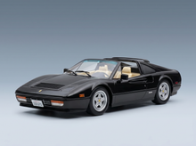 Black Ferrari 328 GTS scale model car with cream interior, showcased for Vroomi collectors