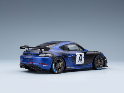 Maqueta de un Porsche GT4 RS Clubsport azul con el número de carrera 4, presentada en Vroomi